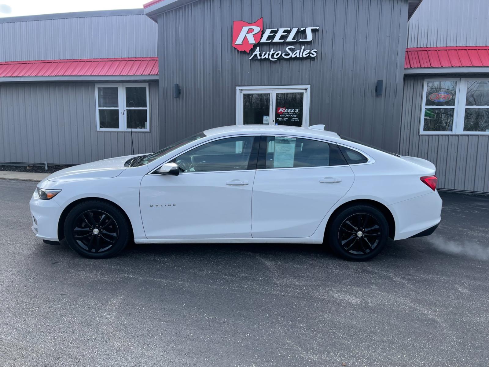2016 White /Black Chevrolet Malibu 1LT (1G1ZE5ST7GF) with an 1.5L I4 DOHC 16V TURBO engine, 6A transmission, located at 11115 Chardon Rd. , Chardon, OH, 44024, (440) 214-9705, 41.580246, -81.241943 - This 2016 Chevrolet Malibu 1LT, is equipped with a 1.5L EcoTec engine and a 6-speed automatic transmission, offers a blend of efficiency and performance. It boasts modern amenities including a backup camera for enhanced safety during reversing, push-button start for convenience, and integrated Apple - Photo #14